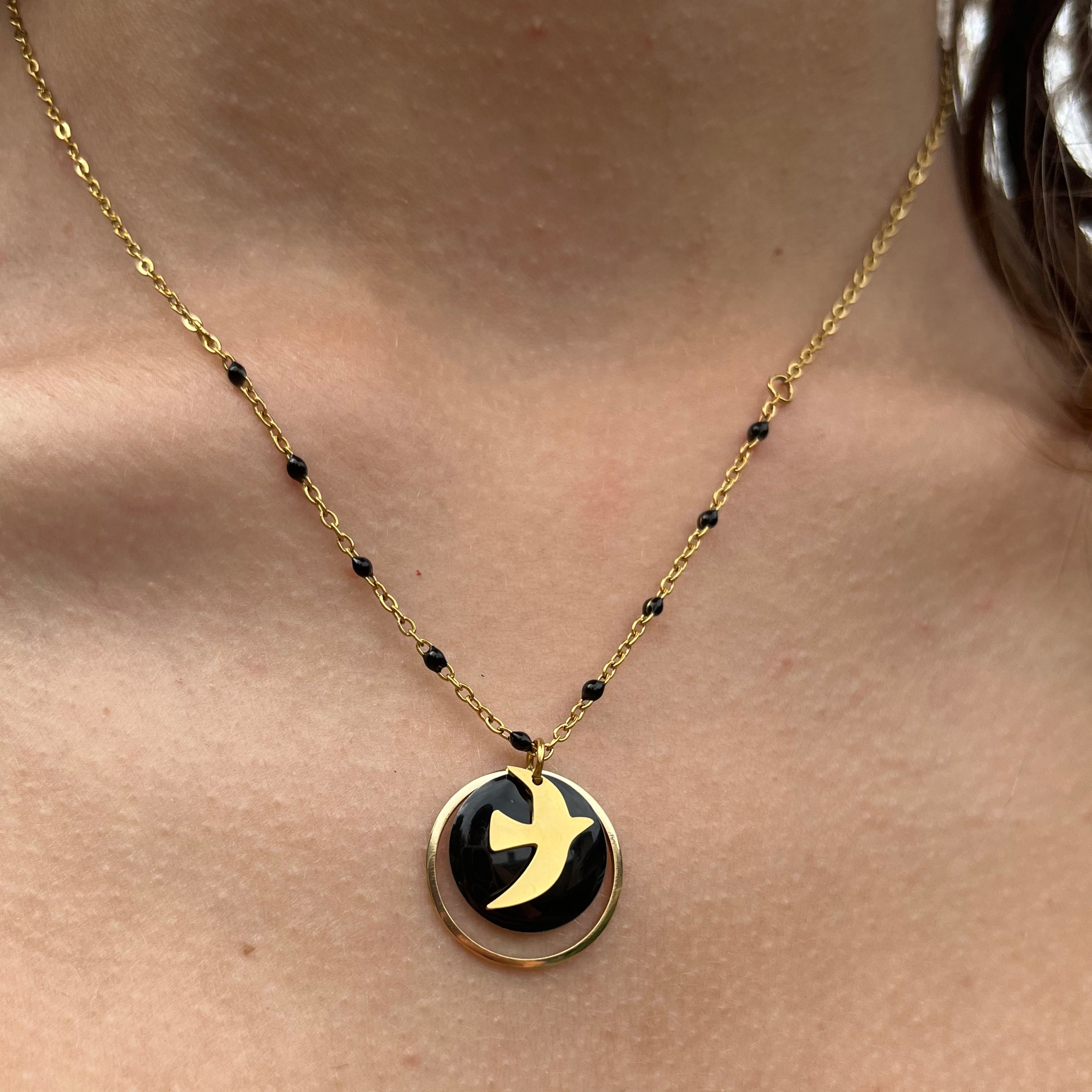 Collier Poème noir doré